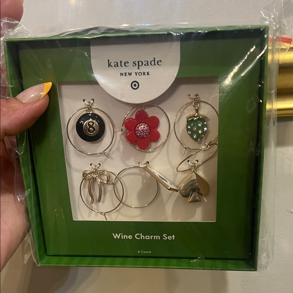 Kate Spade Wine Charm Set with Black, Red, and Gold Accents